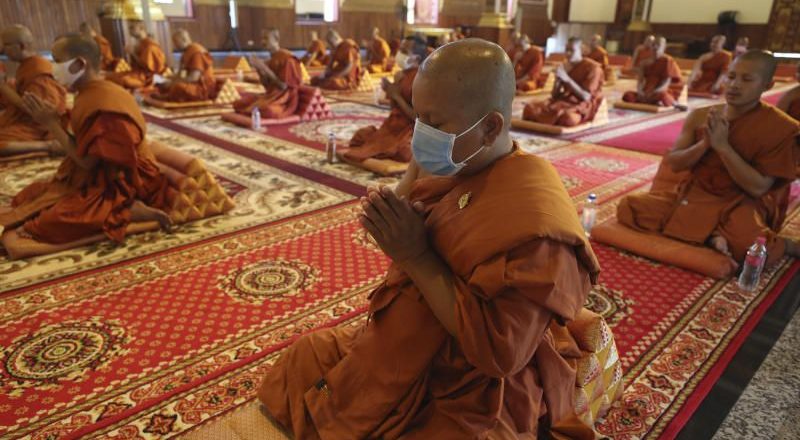 Buddhist monks in Thailand, Cambodia alter ritual during Covid-19 pandemic